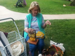 Patti's spun brown yarn, plus new gold and white granny squares